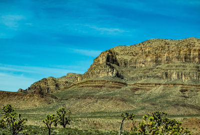 Scenic view of rocky mountains against sky