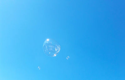 Close-up of moon against clear blue sky