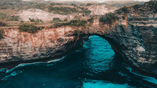 Scenic view of rock formation in sea