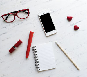 High angle view of smart phone on table