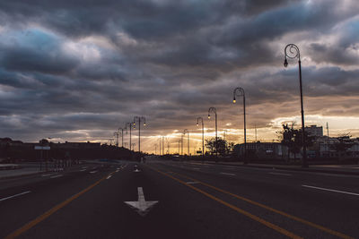 View of road against cloudy sky