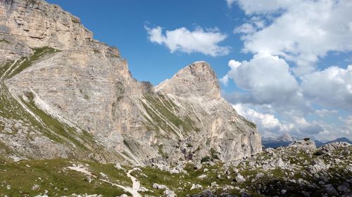 Low angle view of rock formation against sky