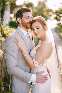 Smiling couple holding hands