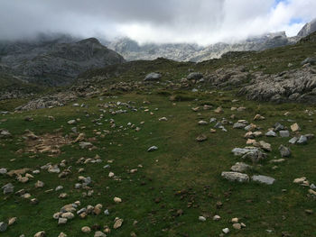 Scenic view of landscape and mountains against sky