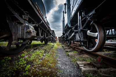 Train on railroad tracks against sky