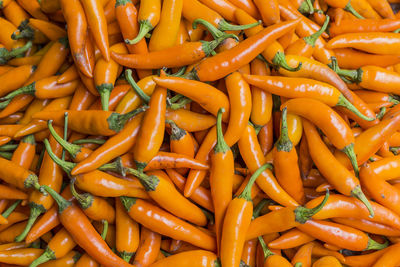 Full frame shot of chili peppers for sale at market stall