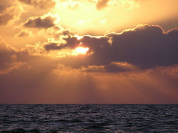 Scenic view of sunset over sea