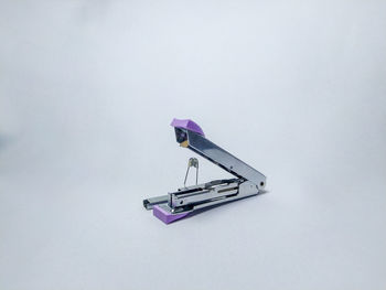 High angle view of stuffed toy over white background