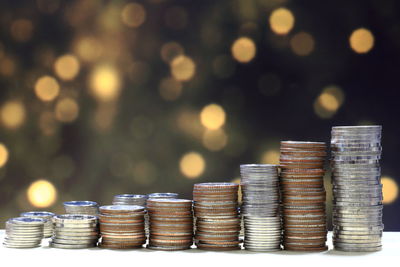 Close-up of coins on table