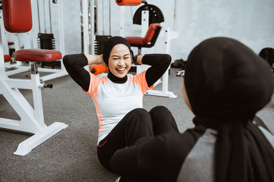 High angle view of man exercising in gym