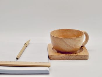 Close-up of coffee cup on table