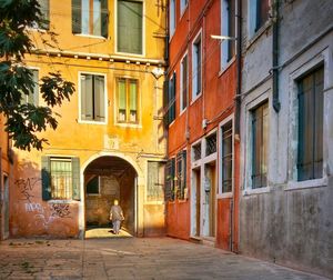 Street amidst residential buildings
