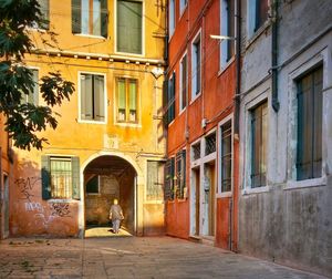 Street amidst residential buildings