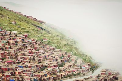 View of landscape with mountain range in background