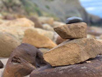 Close-up of stone stack on rock