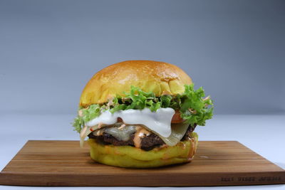 Close-up of burger on table