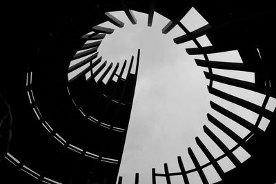 Low angle view of spiral staircase in building