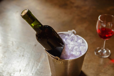 High angle view of wine bottles on table