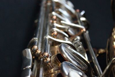 Close-up of chain against black background
