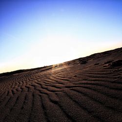 Scenic view of desert against clear sky