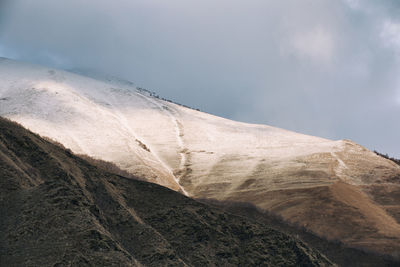 Low angle view of mountain against sky