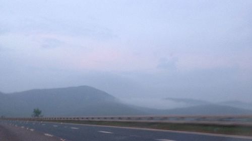 Country road passing through landscape