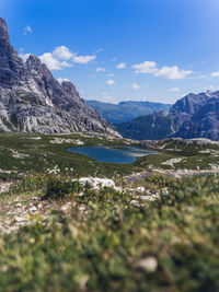 Scenic view of lake and mountains against sky