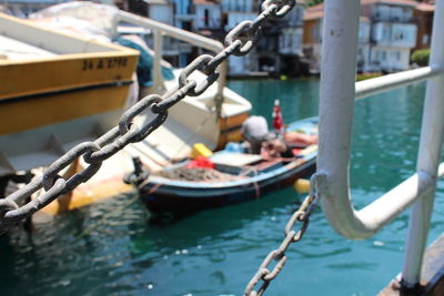 Scenic view of harbor from a ship with a chain link