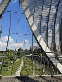 Modern bridge against sky in city