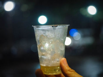 Close-up of hand holding drink