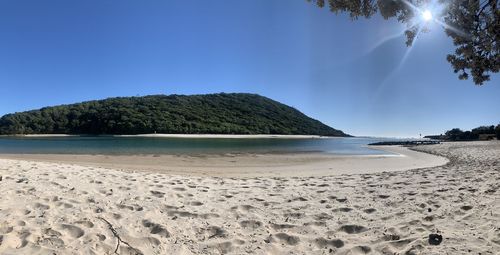 Panoramic view of sea against clear sky