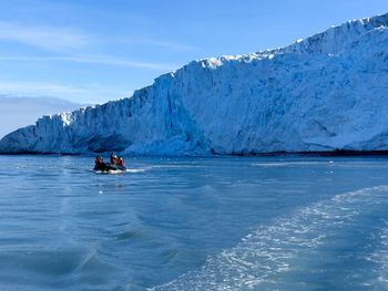 Scenic view of sea against sky during winter