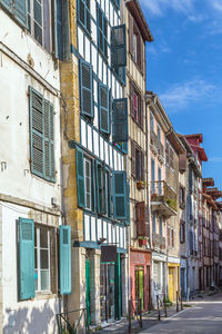 Street with historical houses in bayonne city center, france