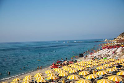 Scenic view of sea against clear blue sky