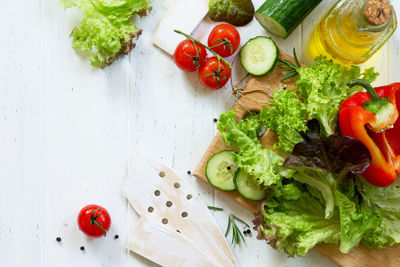 Ingredients cooking for summer salad on a white kitchen table. the concept of nutrition health. 