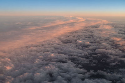 Aerial view of cloudscape against sky during sunset