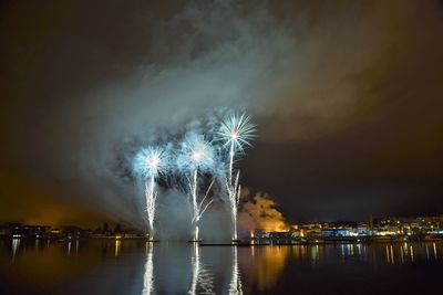 Firework display at night