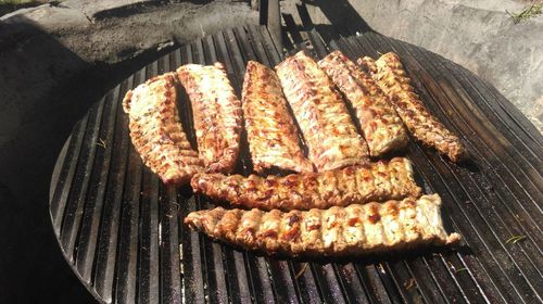 Close-up of ribs on barbecue grill