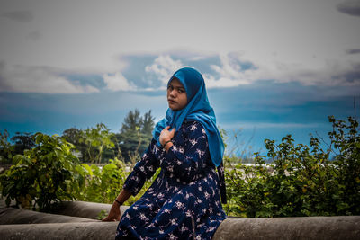 Full length of man in sea against sky