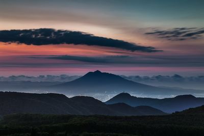 Scenic view of mountains at sunset