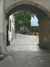 Alley amidst buildings in city