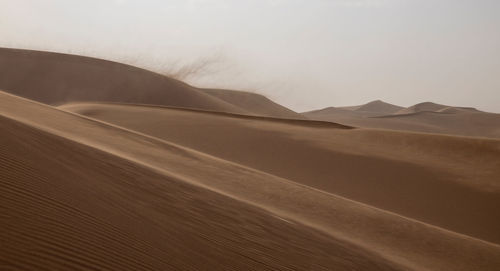 Scenic view of desert against sky