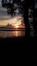 Scenic view of sea at sunset