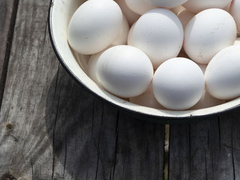 High angle view of eggs in bowl on table