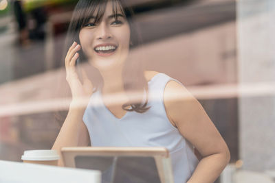 Portrait of a smiling young woman