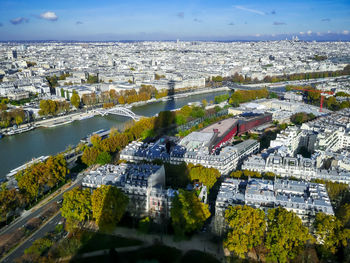 High angle view of crowd by buildings in city