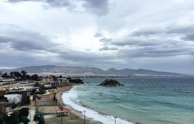 Scenic view of sea against cloudy sky