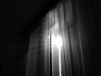 Sun shining through curtain