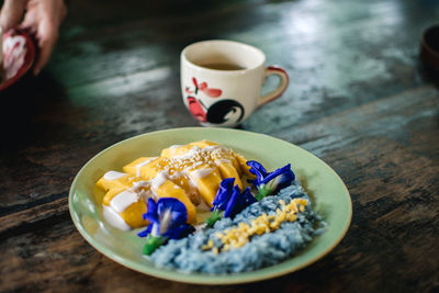 Close-up of coffee cup on table