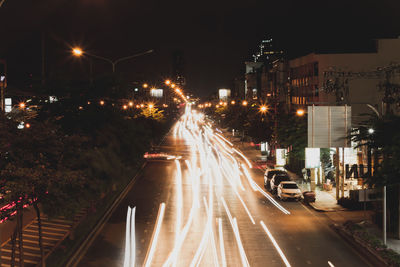 Light trails on city street at night